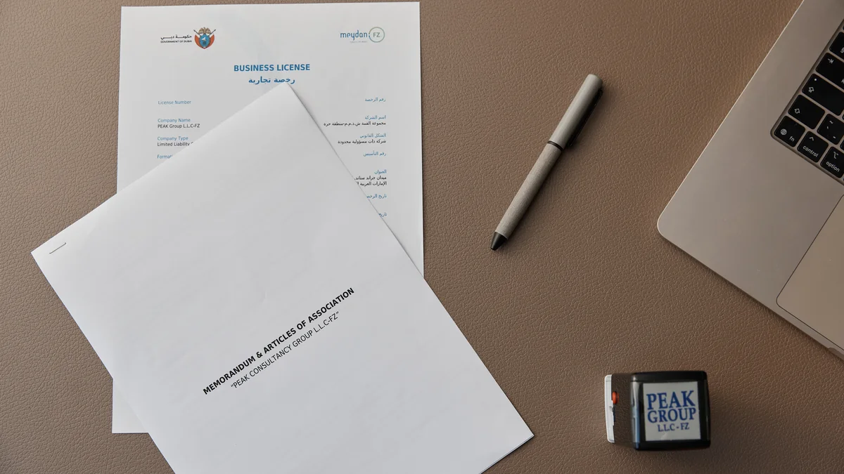 Company-formation paperwork arranged on a desk