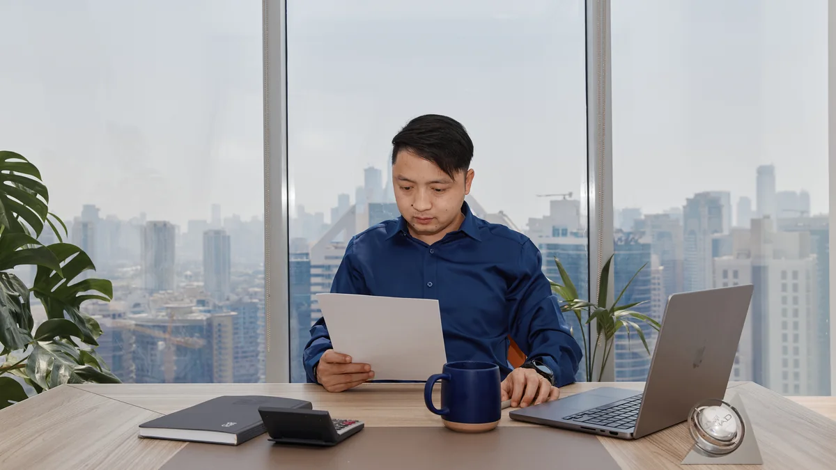 A Peak specialist reviewing tax documents with a client